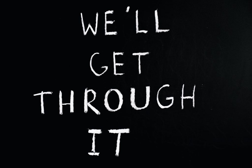 we ll get through it lettering text on black background